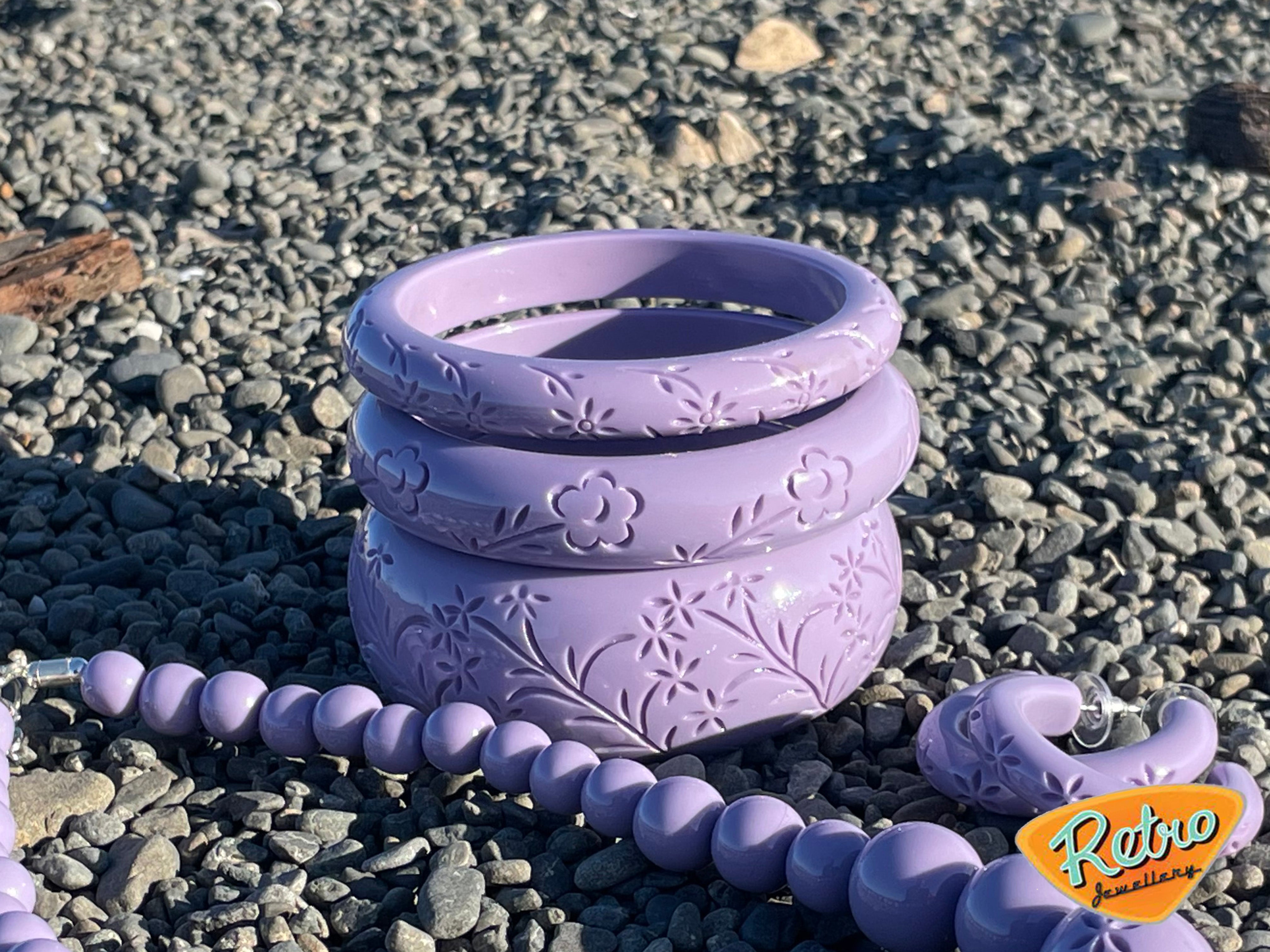 Narrow "Blossom" in lilac by MCR carved fakelite bangle