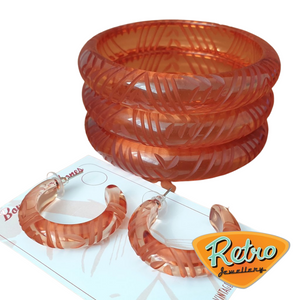 Krystal Prystal carved bangle - Rust